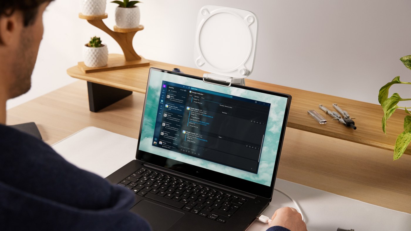 White Elgato Key Light Neo clipped to a laptop screen