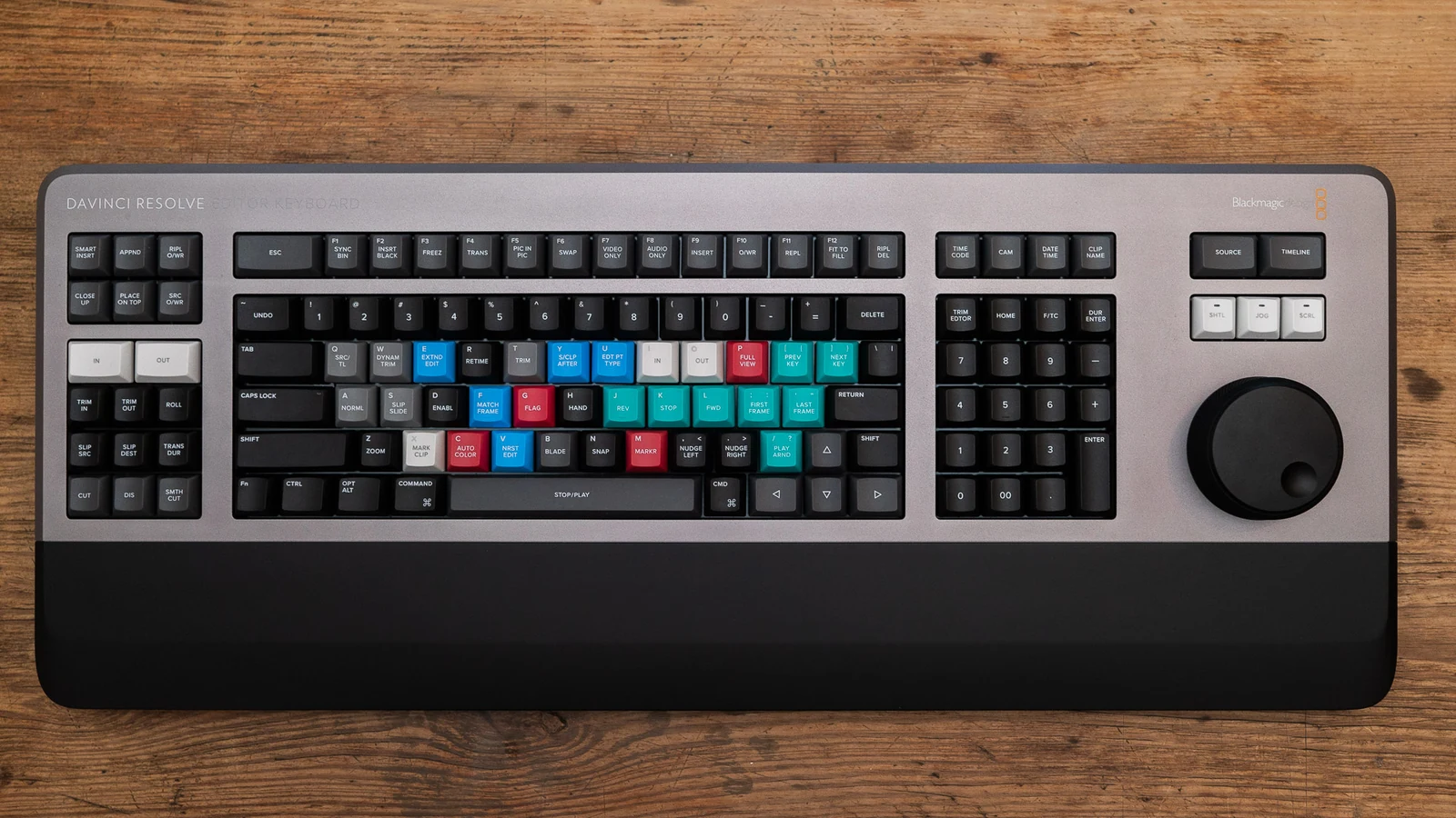 DaVinci Resolve Editor Keyboard with colored keys and jog wheel