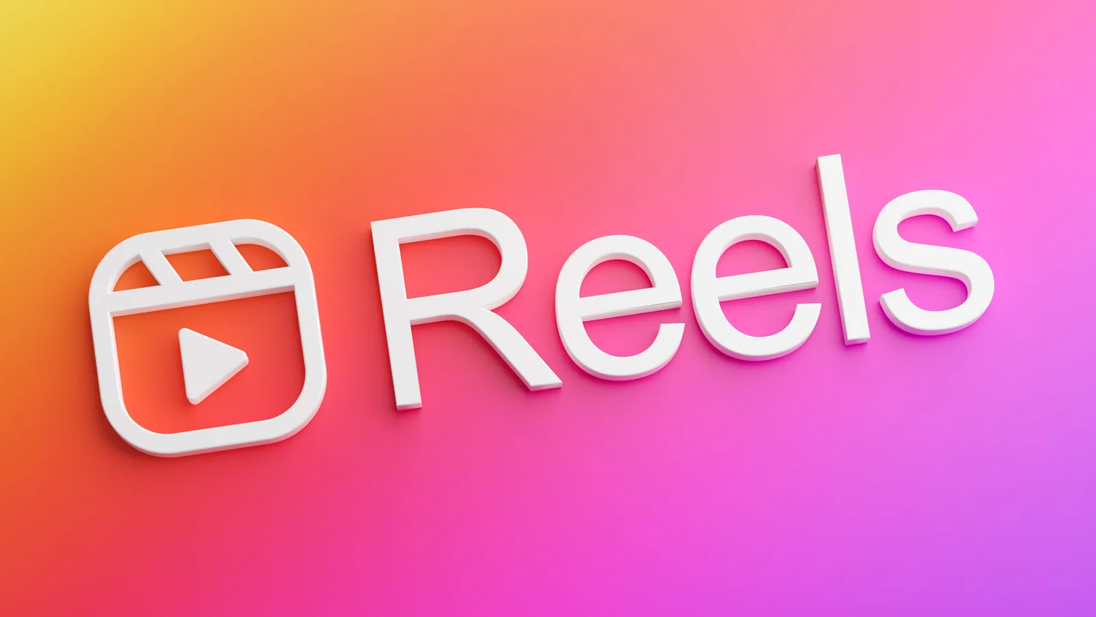 Instagram Reels logo in white on an orange, pink and purple gradient background