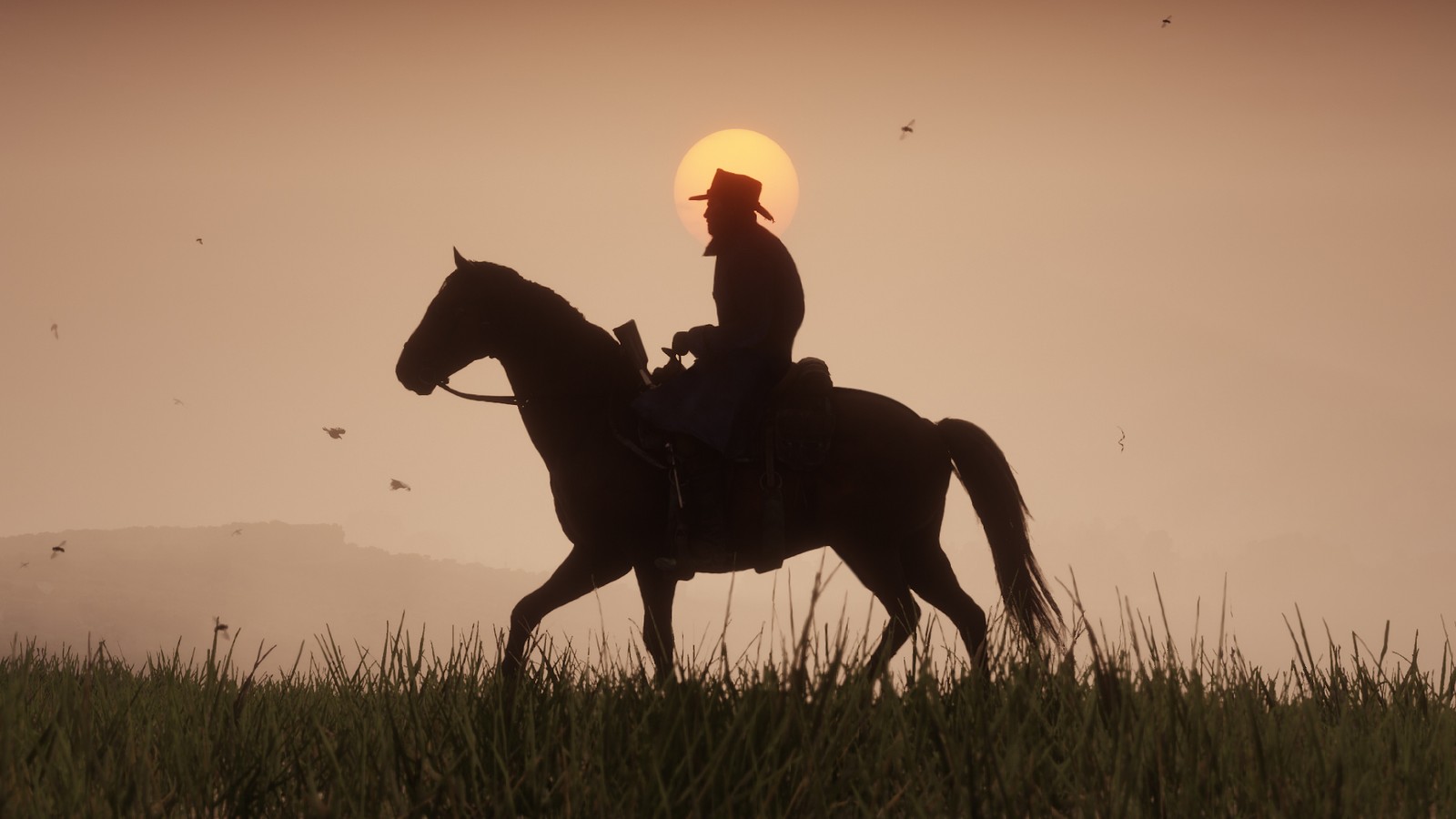 Silueta de un jinete a caballo frente al sol al atardecer en Red Dead Redemption 2
