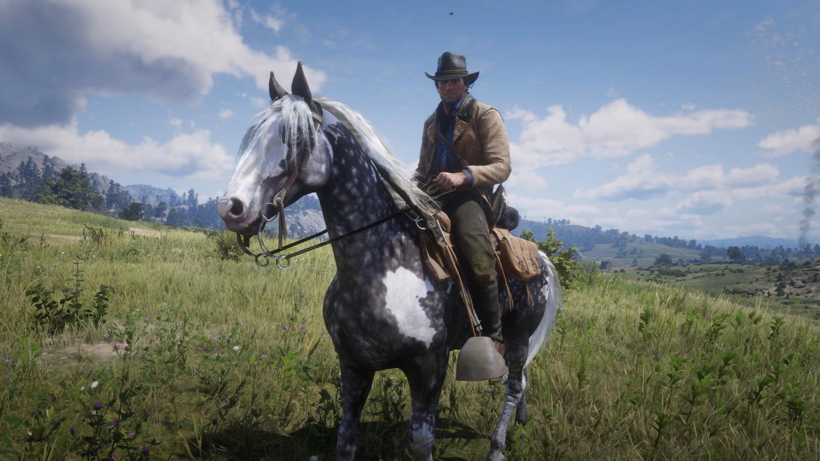 Arthur Morgan montado en un caballo Missouri Fox Trotter en Red Dead Redemption 2